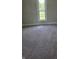 Neutral bedroom with carpeted floors and natural light coming through the window at 4303 W County Road 200 S Rd, Danville, IN 46122