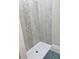 The tiled shower is equipped with a white shower base and a vertical tile accent wall at 4303 W County Road 200 S Rd, Danville, IN 46122