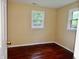Cozy bedroom featuring hardwood floors and a bright window view at 4675 N Herbemont Rd, Martinsville, IN 46151