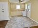 Kitchen showing neutral colored cabinets and a tile floor at 4675 N Herbemont Rd, Martinsville, IN 46151