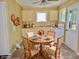 Cozy kitchen with dining area, natural light, and ample storage, ideal for Gathering meals at 4675 N Herbemont Rd, Martinsville, IN 46151