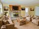 Inviting living room with stone fireplace, wood accents, and comfortable seating. Perfect for relaxation at 4675 N Herbemont Rd, Martinsville, IN 46151