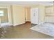 The image displays a living room with a view of the kitchen at 4675 N Herbemont Rd, Martinsville, IN 46151