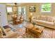 Open-concept living space features a dining area, comfortable seating, and abundant natural light at 4675 N Herbemont Rd, Martinsville, IN 46151