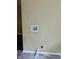 Interior shot of the wall with plumbing hookups and flooring of the residence at 4675 N Herbemont Rd, Martinsville, IN 46151
