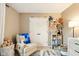 Comfortable Bedroom room with a plush chair, storage, and neutral decor at 4701 Candy Spots Dr, Indianapolis, IN 46237