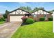Charming brick home with a well-manicured lawn and fresh landscaping at 4701 Candy Spots Dr, Indianapolis, IN 46237