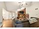 Cozy living room with a brick fireplace and large windows for natural light at 4701 Candy Spots Dr, Indianapolis, IN 46237