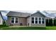 Charming backyard featuring well-maintained lawn and neutral siding at 4960 Silverbell Dr, Plainfield, IN 46168