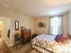 Comfortable bedroom featuring a patterned bed and wood-look floors at 4960 Silverbell Dr, Plainfield, IN 46168