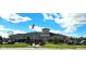 Clubhouse exterior featuring well-maintained lawns, and a charming architectural design at 4960 Silverbell Dr, Plainfield, IN 46168