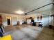 A spacious garage with extra storage areas and access to other parts of the house at 4960 Silverbell Dr, Plainfield, IN 46168