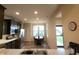Well-lit kitchen with modern appliances and an adjacent dining area at 4960 Silverbell Dr, Plainfield, IN 46168