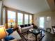Bright living room with two couches, new flooring, and large windows at 4960 Silverbell Dr, Plainfield, IN 46168