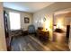 Inviting living room with a workspace and a glimpse into the adjacent bedroom at 4960 Silverbell Dr, Plainfield, IN 46168