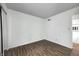 Simple bedroom featuring wood-look floors and a mirrored closet at 5097 Vantage Point Rd # B 2, Avon, IN 46123
