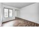 Bright bedroom featuring a window view and a closet with mirrored doors at 5097 Vantage Point Rd # B 2, Avon, IN 46123