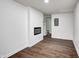 Bedroom features wood floors and modern fireplace at 5097 Vantage Point Rd # B 2, Avon, IN 46123