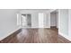 Bright living room features wood floors, sliding glass doors, and white trim at 5097 Vantage Point Rd # B 2, Avon, IN 46123