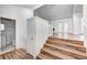 Spacious staircase leading to the vaulted ceiling living room with fireplace at 5097 Vantage Point Rd # B 2, Avon, IN 46123