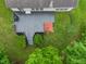 An aerial view shows a backyard deck with seating, a grill, and a small hot tub at 5640 High Vista Cir, Indianapolis, IN 46234