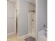 Bathroom features a shower/tub combo and neutral tones at 5640 High Vista Cir, Indianapolis, IN 46234