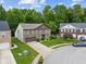 Charming two-story home on a cul-de-sac with lush landscaping, a two-car garage, and brick facade at 5640 High Vista Cir, Indianapolis, IN 46234