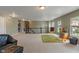 A large loft space perfect for , featuring play areas and comfortable seating at 5640 High Vista Cir, Indianapolis, IN 46234