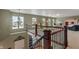 An open loft area bathed in natural light, featuring comfortable seating and play areas at 5640 High Vista Cir, Indianapolis, IN 46234