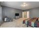 Large main bedroom provides great natural light, carpet flooring, and a sitting area at 5640 High Vista Cir, Indianapolis, IN 46234