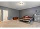 Well-lit main bedroom offers carpet flooring and ample space for furnishings at 5640 High Vista Cir, Indianapolis, IN 46234