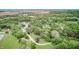 Expansive aerial view showing the proximity to nature, ponds, and neighboring farmland at 5739 Paradise Dr, Martinsville, IN 46151