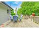 Inviting wooden deck with dining set surrounded by peaceful greenery at 5739 Paradise Dr, Martinsville, IN 46151