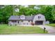 Charming home featuring a blend of architectural styles and an attached two car garage at 5739 Paradise Dr, Martinsville, IN 46151
