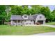Charming home featuring a blend of architectural styles and an attached two car garage at 5739 Paradise Dr, Martinsville, IN 46151