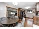 Open kitchen and dining area featuring hardwood floors and stainless steel appliances at 5739 Paradise Dr, Martinsville, IN 46151
