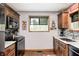 Close up of the kitchen showcasing granite countertops, and stainless appliances at 5739 Paradise Dr, Martinsville, IN 46151