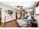 Spacious living room with hardwood floors, comfortable seating, and a staircase leading to the upper level at 5739 Paradise Dr, Martinsville, IN 46151