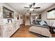 Spacious living room with hardwood floors, comfortable seating, and a staircase leading to the upper level at 5739 Paradise Dr, Martinsville, IN 46151