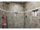 Luxurious tiled shower with dual shower heads and built-in storage niches at 5739 Paradise Dr, Martinsville, IN 46151