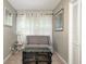 Cozy sitting room offering neutral colors, carpet, curtains, and accent table at 5739 Paradise Dr, Martinsville, IN 46151