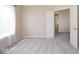 This bedroom features carpeted floors, white trim and ample natural light at 6105 Franklin Villas Way, Indianapolis, IN 46237