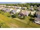 Aerial view of backyard featuring a patio and mature trees providing privacy at 6337 Ederline Ln, Noblesville, IN 46062