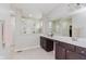 Bathroom featuring double vanities, custom cabinetry and walk in shower at 6337 Ederline Ln, Noblesville, IN 46062