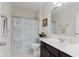 Clean bathroom featuring a vanity, toilet, mirror, and shower with a patterned curtain at 6337 Ederline Ln, Noblesville, IN 46062
