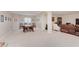 Bright dining area with a wooden table and seating, with seamless access to the living room at 6337 Ederline Ln, Noblesville, IN 46062