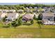 Exterior aerial view of a house with a large manicured lawn and mature trees at 6337 Ederline Ln, Noblesville, IN 46062