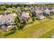 Exterior aerial view of a house with a large manicured lawn with mature trees at 6337 Ederline Ln, Noblesville, IN 46062