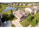 Aerial view of an attractive home with a long driveway and pond views at 6337 Ederline Ln, Noblesville, IN 46062