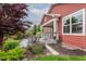 Charming home exterior with a spacious patio, lush greenery, and manicured landscaping at 6337 Ederline Ln, Noblesville, IN 46062